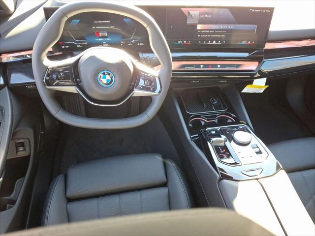 used 2025 BMW i5 car, priced at $73,000