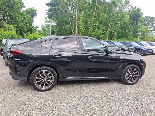 used 2025 BMW X6 car, priced at $73,750