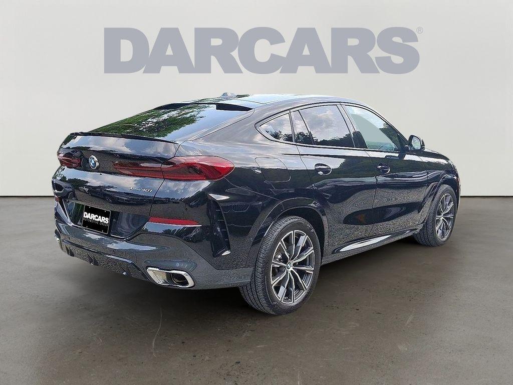 used 2025 BMW X6 car, priced at $67,900