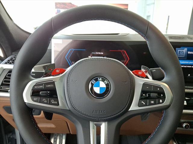 new 2025 BMW X6 M car, priced at $144,975