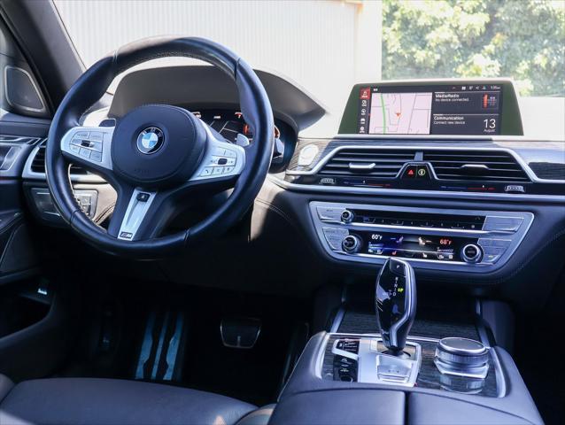 used 2022 BMW 740 car, priced at $41,299