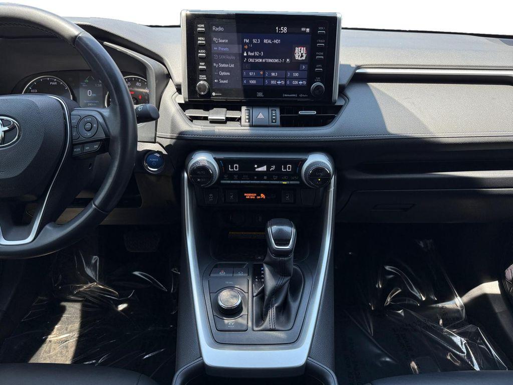 used 2021 Toyota RAV4 Hybrid car, priced at $29,499