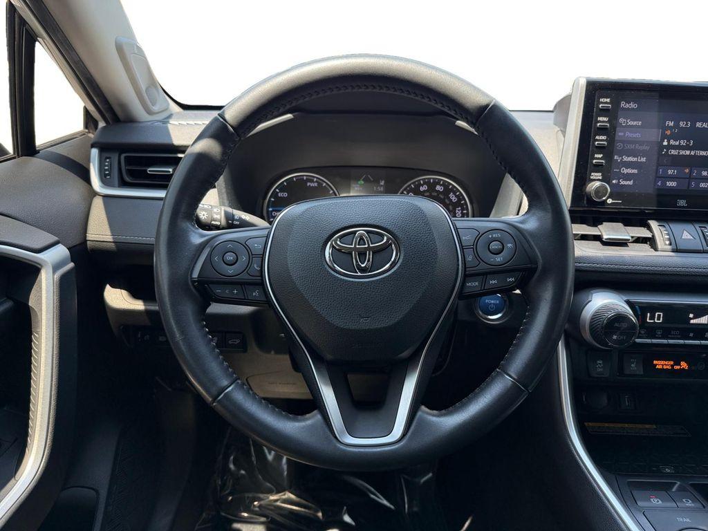 used 2021 Toyota RAV4 Hybrid car, priced at $29,499
