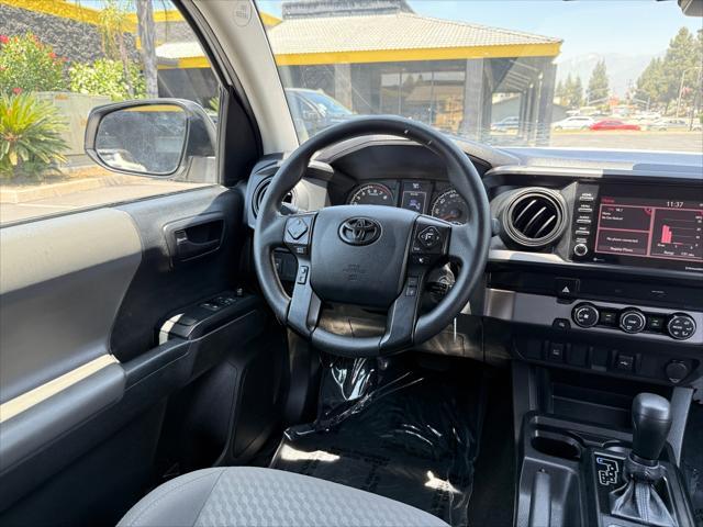 used 2022 Toyota Tacoma car, priced at $26,299