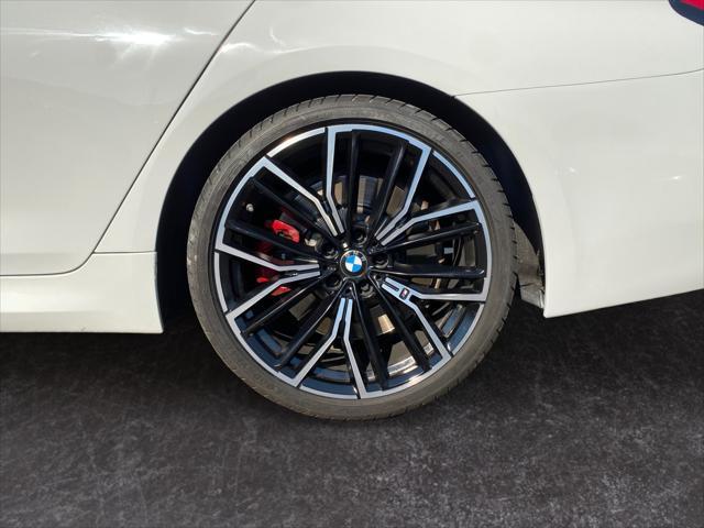 used 2023 BMW M550 car, priced at $53,399