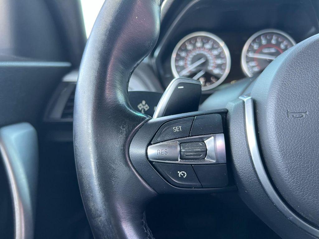 used 2015 BMW 228 car, priced at $13,899