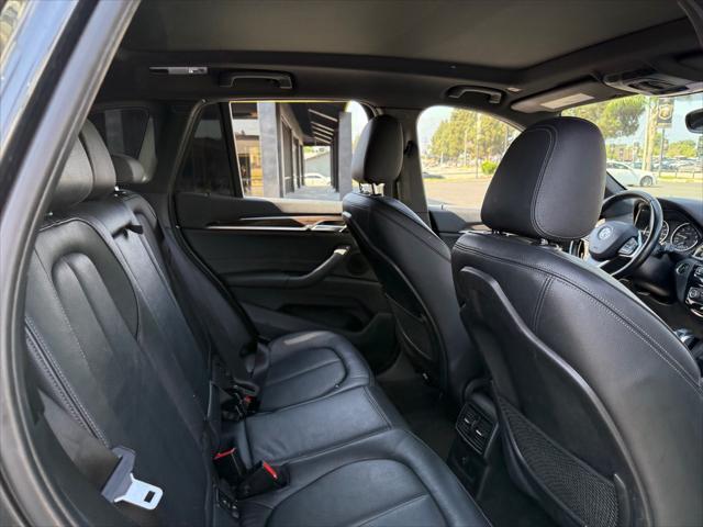 used 2018 BMW X1 car, priced at $18,899