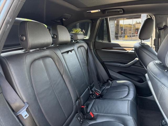 used 2018 BMW X1 car, priced at $18,899