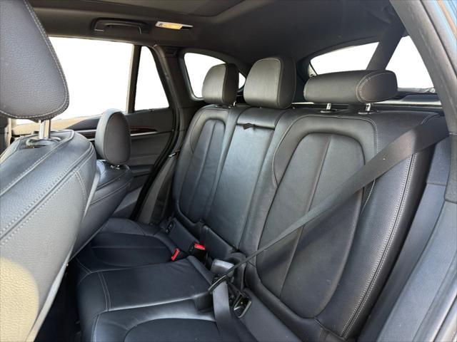 used 2018 BMW X1 car, priced at $18,899