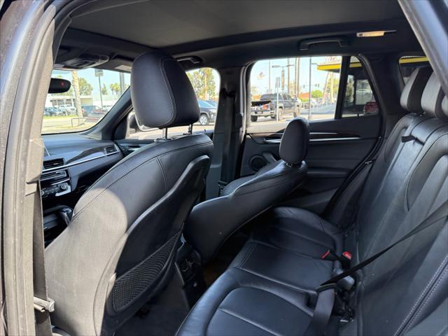 used 2018 BMW X1 car, priced at $18,899
