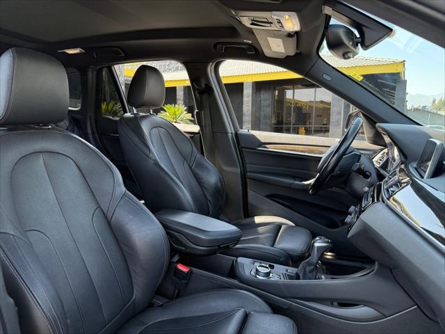 used 2018 BMW X1 car, priced at $18,899
