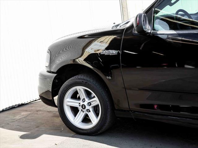 used 2003 Ford F-150 car, priced at $31,899