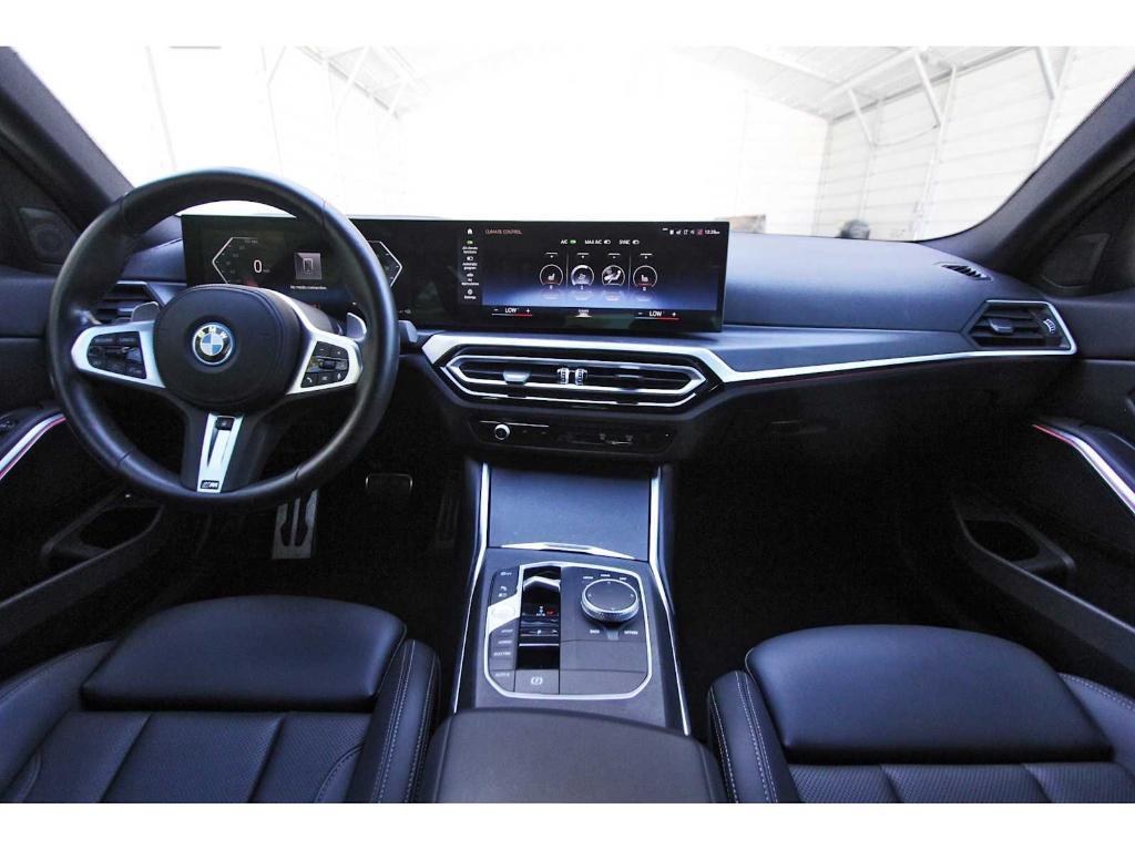 used 2023 BMW 330e car, priced at $31,499