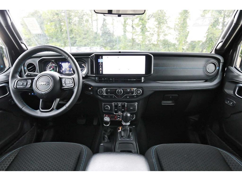 used 2024 Jeep Wrangler 4xe car, priced at $38,448