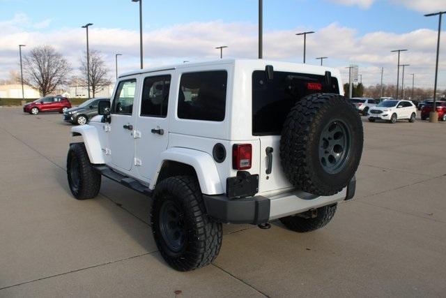 used 2013 Jeep Wrangler Unlimited car, priced at $18,885