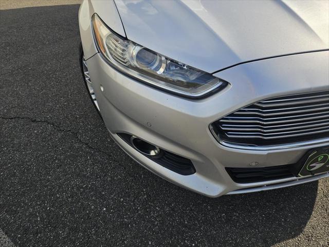 used 2014 Ford Fusion Hybrid car, priced at $5,900