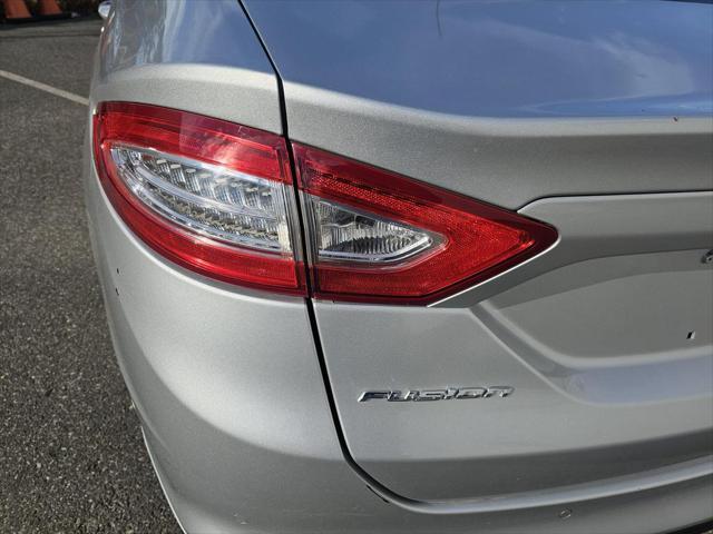 used 2014 Ford Fusion Hybrid car, priced at $5,900