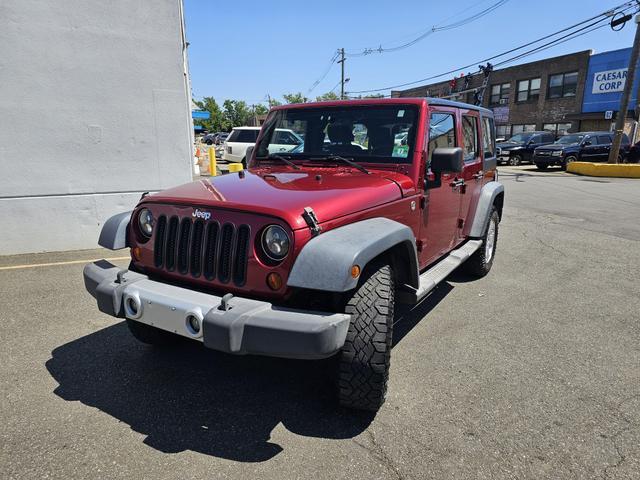 used 2013 Jeep Wrangler Unlimited car, priced at $9,900