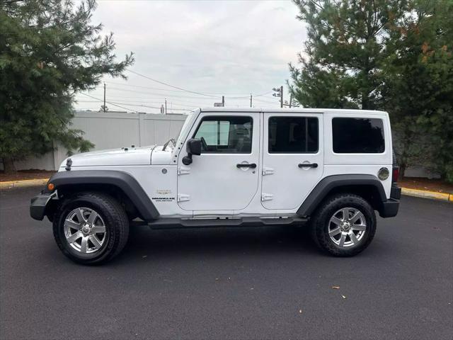 used 2015 Jeep Wrangler Unlimited car, priced at $15,999