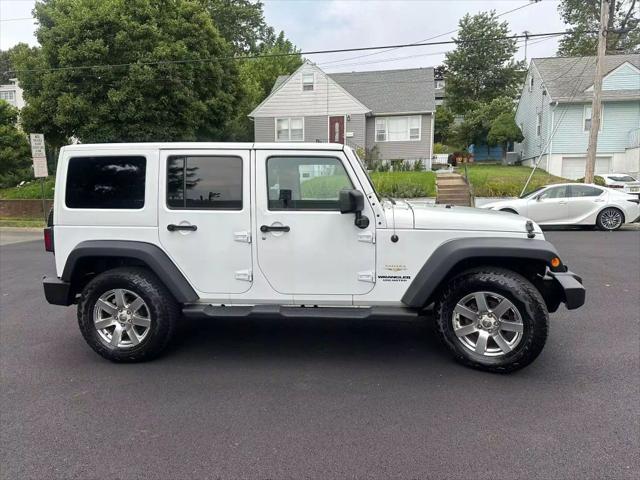 used 2015 Jeep Wrangler Unlimited car, priced at $15,999