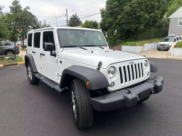 used 2015 Jeep Wrangler Unlimited car, priced at $15,999