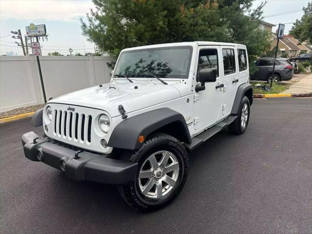 used 2015 Jeep Wrangler Unlimited car, priced at $15,999