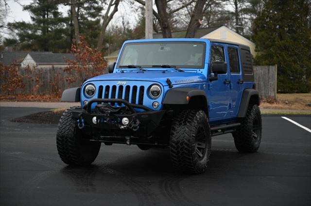 used 2015 Jeep Wrangler Unlimited car, priced at $22,950