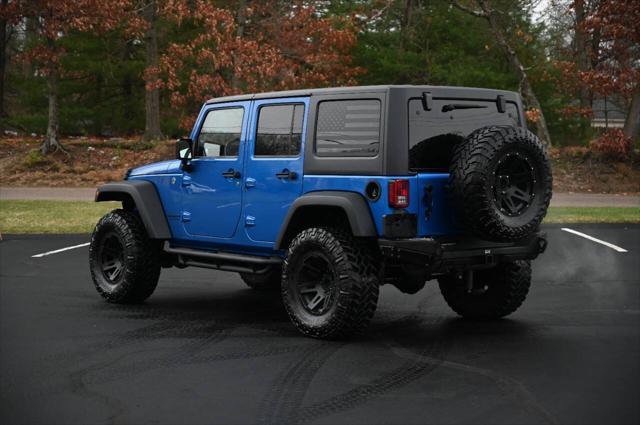 used 2015 Jeep Wrangler Unlimited car, priced at $22,950