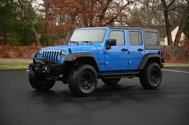 used 2015 Jeep Wrangler Unlimited car, priced at $22,950