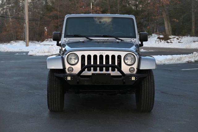 used 2014 Jeep Wrangler Unlimited car, priced at $13,895