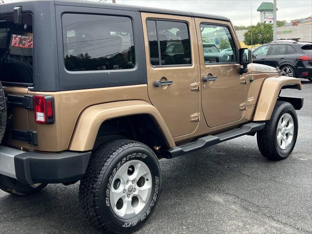 used 2015 Jeep Wrangler Unlimited car, priced at $12,965