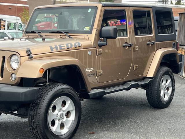 used 2015 Jeep Wrangler Unlimited car, priced at $12,965