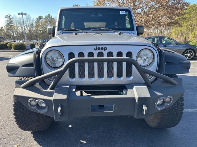 used 2015 Jeep Wrangler Unlimited car, priced at $18,589