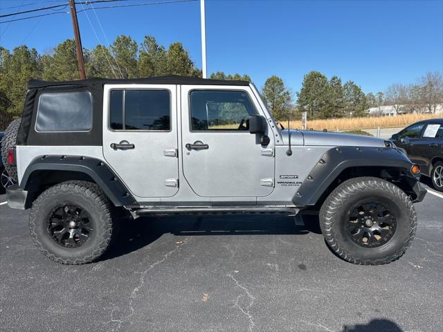 used 2015 Jeep Wrangler Unlimited car, priced at $18,589