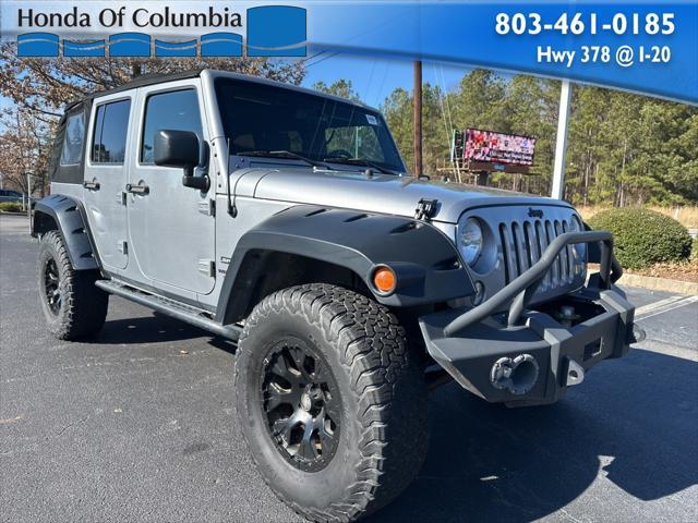 used 2015 Jeep Wrangler Unlimited car, priced at $18,589