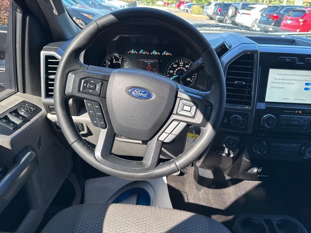 used 2018 Ford F-150 car, priced at $25,000