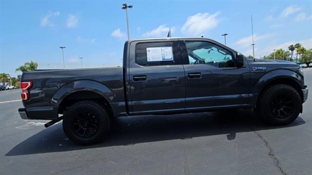 used 2019 Ford F-150 car, priced at $27,296