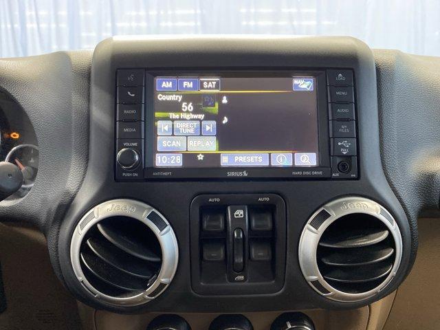 used 2015 Jeep Wrangler Unlimited car, priced at $15,299