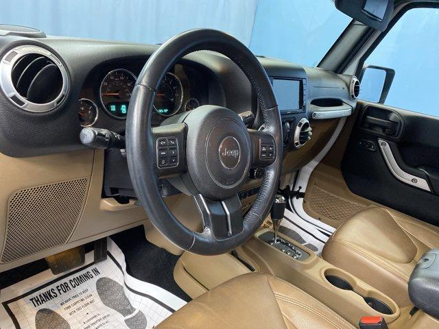 used 2015 Jeep Wrangler Unlimited car, priced at $15,299