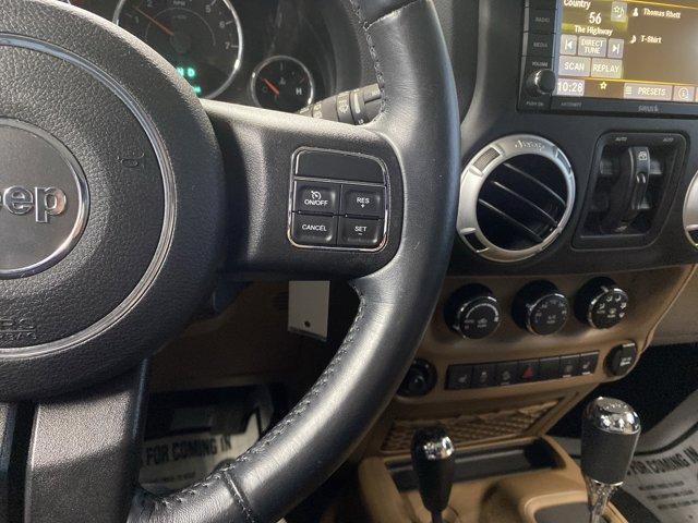 used 2015 Jeep Wrangler Unlimited car, priced at $15,299