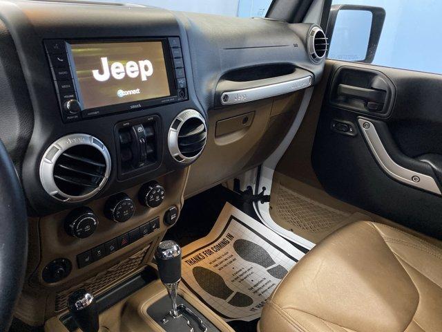 used 2015 Jeep Wrangler Unlimited car, priced at $15,299