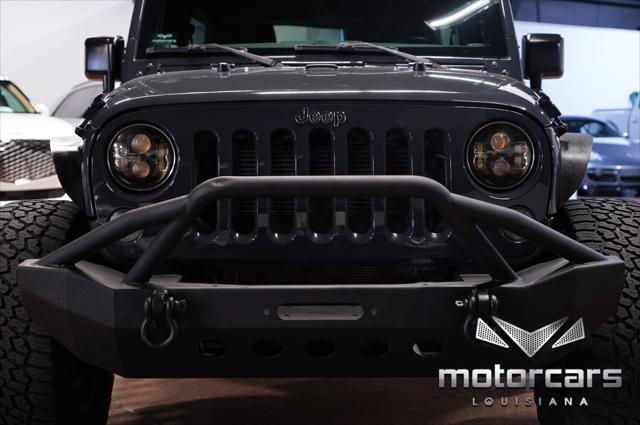 used 2016 Jeep Wrangler Unlimited car, priced at $22,900