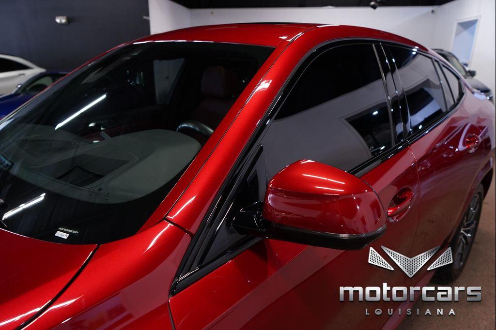 used 2022 BMW X6 car, priced at $54,900