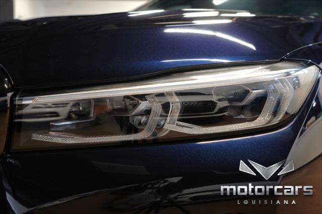 used 2022 BMW 740 car, priced at $49,900