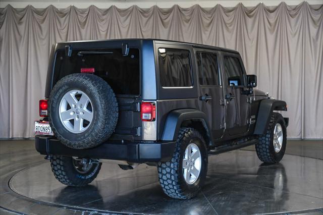 used 2018 Jeep Wrangler Unlimited car, priced at $14,995