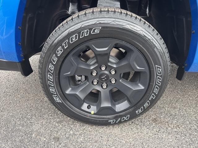 new 2025 Ram 1500 car, priced at $49,997