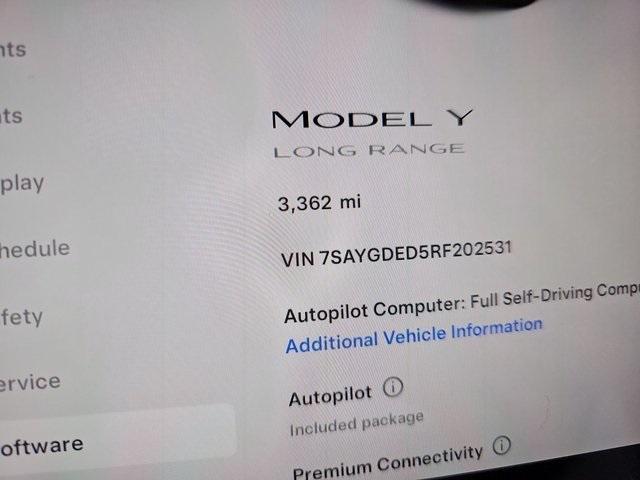 used 2024 Tesla Model Y car, priced at $34,997