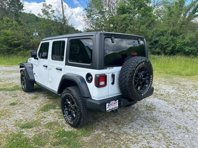 used 2021 Jeep Wrangler Unlimited car, priced at $27,996