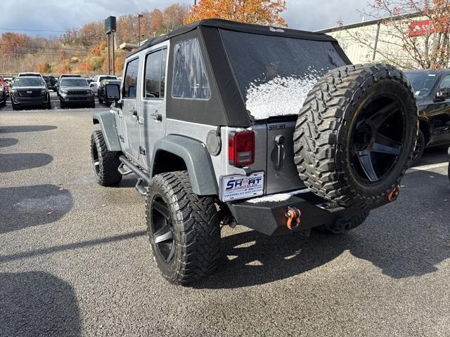 used 2015 Jeep Wrangler Unlimited car, priced at $21,300