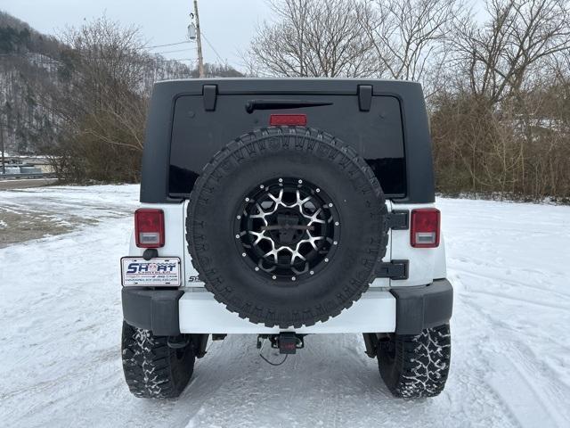 used 2016 Jeep Wrangler car, priced at $23,496